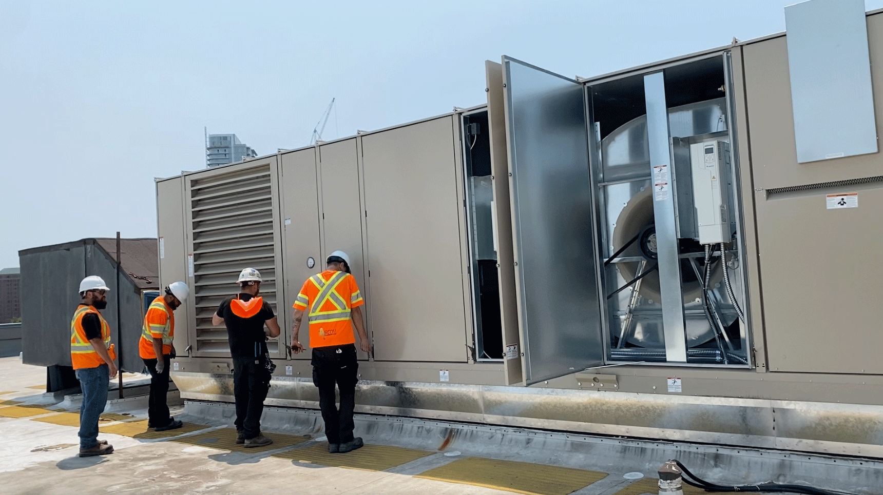 A Daikin Rooftop Unit Lifted Onto A Building.